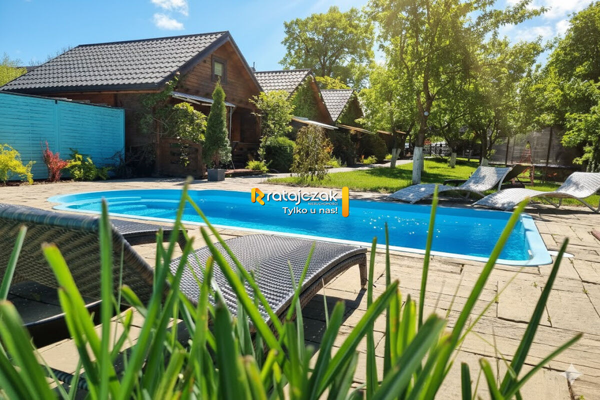 Dom jednorodzinny + 6 domków letniskowychStegna